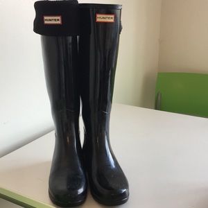 Tall black hunter rain boots